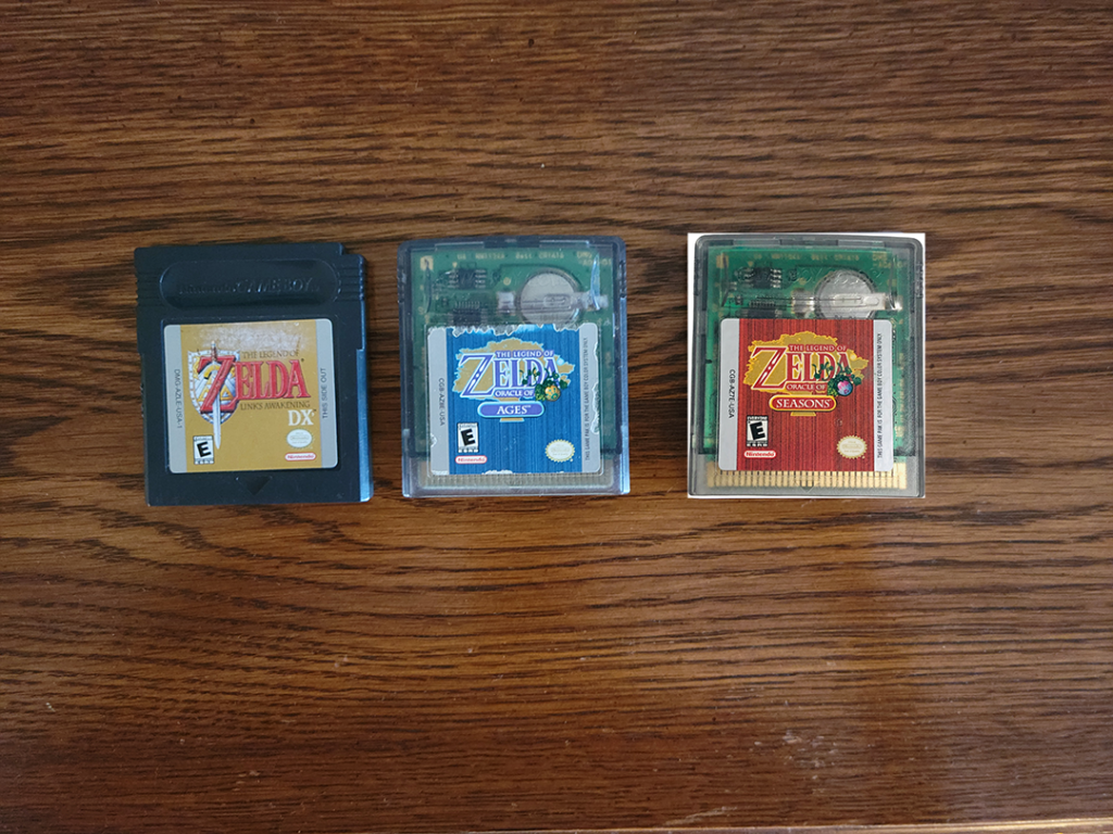 Zelda: Link's Awakening DX, Zelda: Oracle of Ages, and a badly photoshopped Zelda: Oracle of Seasons for the Gameboy Color