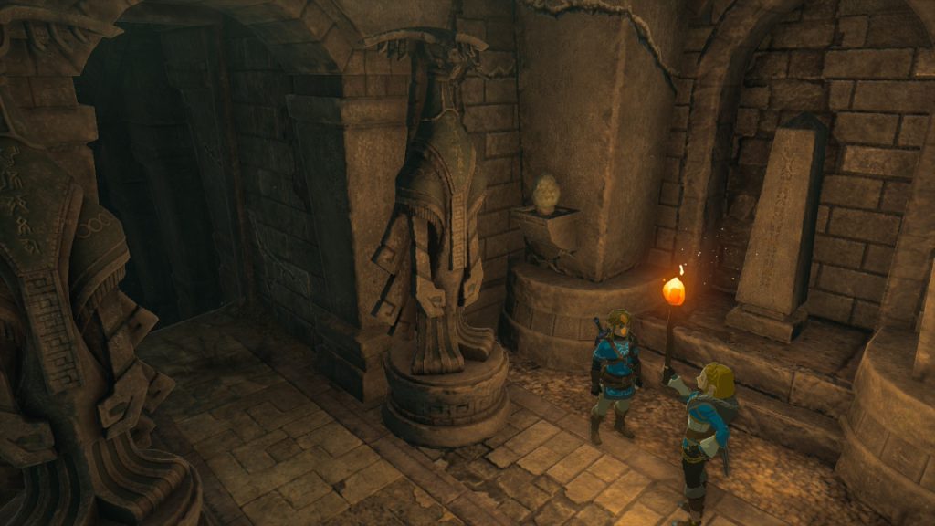 Zelda: TotK screenshot - Link and Zelda observing some Zonai statues.
